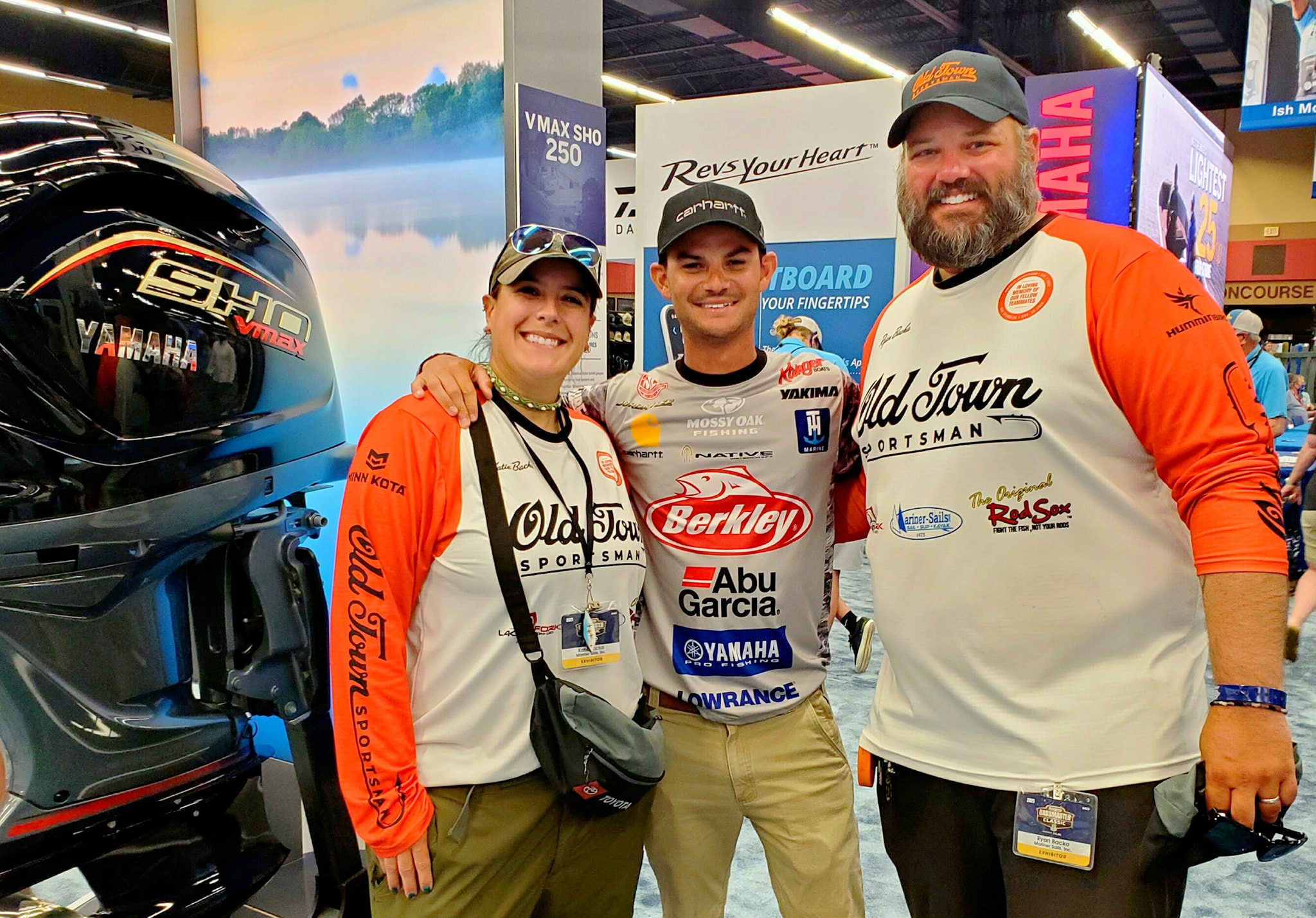 A photo of Katie and Ryan Backa with Bassmaster Jordan Lee