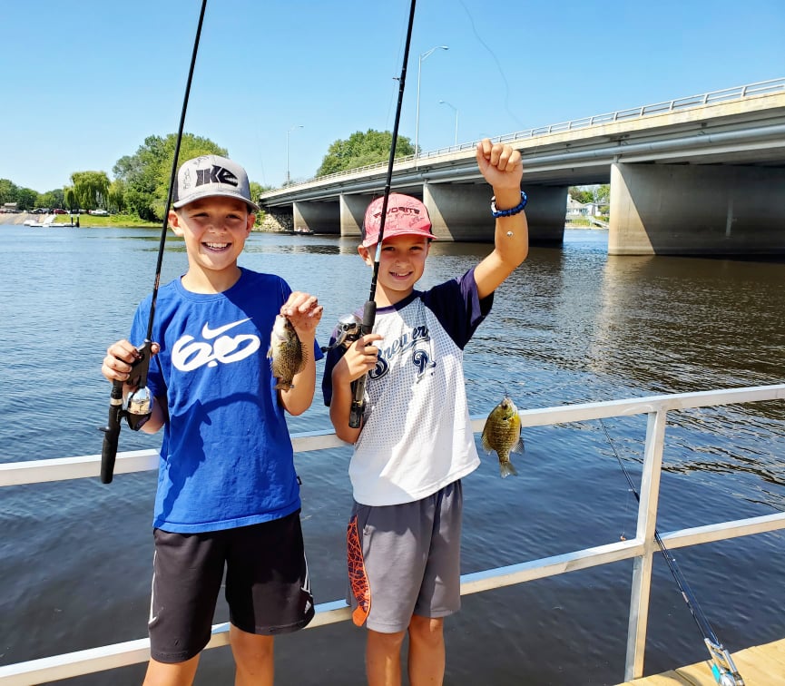 Boys with a catch at the MLF Kids Derby in La Crosse, Wisconsin