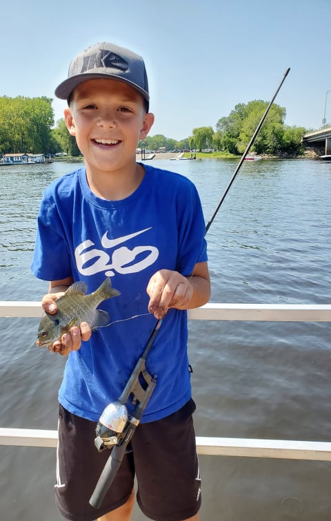 Boy with a catch at the MLF Kids Derby in La Crosse, Wisconsin
