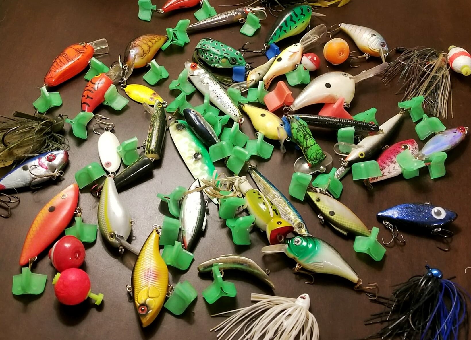 Numerous hard fishing lures found and refurbished by Katie