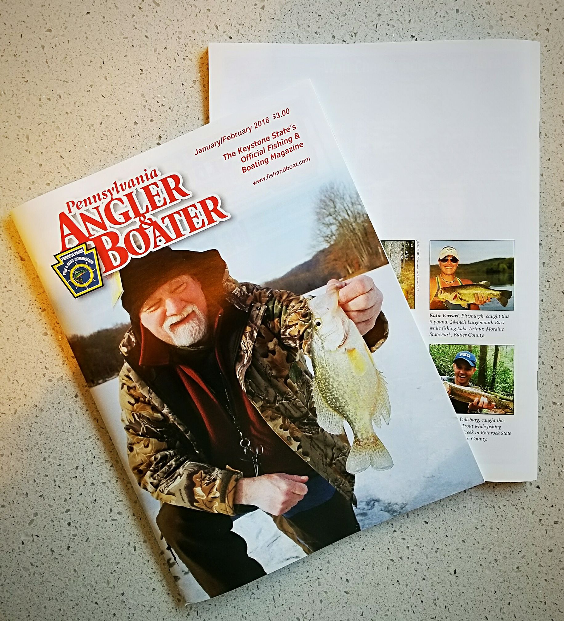 A picture of Katie on the back of a Pennsylvania Angler Magazine in 2017